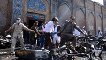 Afghan volunteers carry victims at the scene of a motorcycle bomb explosion in front of the Jami Mosque in Herat on June 6, 2017.


A motorcycle bomb exploded near the Grand Mosque in the western city of Herat, killing seven people and wounding 16 according to the interior ministry. / AFP PHOTO / HOSHANG HASHIMI        (Photo credit should read HOSHANG HASHIMI/AFP/Getty Images)