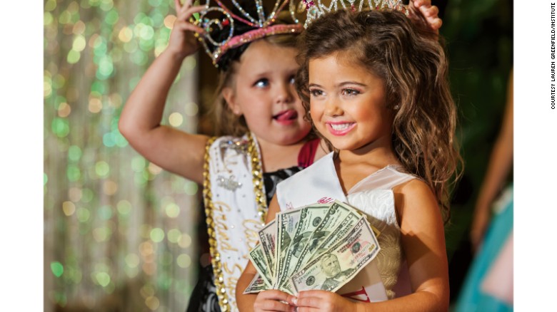 Kailia Deliz, 5, receives her cash award for winning the Ventura County &quot;Summer Fun&quot; Beauty Pageant in 2011.&lt;br /&gt;