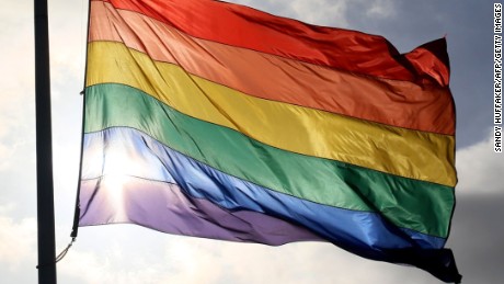 TOPSHOT - A pride flag stands a half mast during a memorial service in San Diego, California on June 12, 2016, for the victims of the Orlando Nighclub shooting.
Fifty people died when a gunman allegedly inspired by the Islamic State group opened fire inside a gay nightclub in Florida, in the worst terror attack on US soil since September 11, 2001. / AFP / Sandy Huffaker        (Photo credit should read SANDY HUFFAKER/AFP/Getty Images)