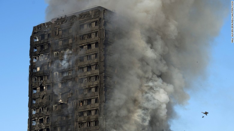 Smoke rises from the fire at the Grenfell Tower apartment block in North Kensington, London, on Wednesday, June 14. According to the London Fire Brigade, 40 fire engines and 200 firefighters are working to put out the blaze. Residents in the tower were said to be evacuating and a number of people were treated for a 
