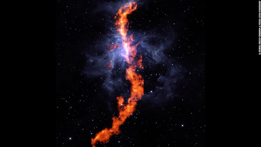 This striking image is the stellar nursery in the Orion Nebula, where stars are born. The red filament is a stretch of ammonia molecules measuring 50 light-years long. The blue represents the gas of the Orion Nebula. This image is a composite of observation from the Robert C. Byrd Green Bank Telescope and NASA&#39;s Wide-field Infrared Survey Explore telescope. &quot;We still don&#39;t understand in detail how large clouds of gas in our Galaxy collapse to form new stars,&quot; said Rachel Friesen, one of the collaboration&#39;s co-Principal Investigators. &quot;But ammonia is an excellent tracer of dense, star-forming gas.&quot; 