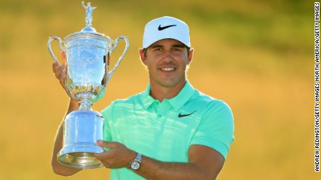 HARTFORD, WI - JUNE 18:  Brooks Koepka of the United States poses with the winner&#39;s trophy after his victory at the 2017 U.S. Open at Erin Hills on June 18, 2017 in Hartford, Wisconsin.  (Photo by Andrew Redington/Getty Images)