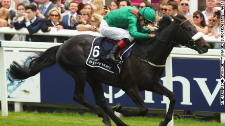 EPSOM, ENGLAND - JUNE 04:  Number Six, Harzand  wins the Investec Epsom Derby at Epsom Racecourse on June 4, 2016 in Epsom, England.  (Photo by Andrew Redington/Getty Images)