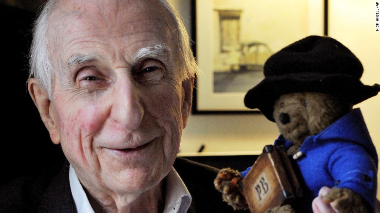 Bond poses with a toy version of Paddington Bear in 2015.
