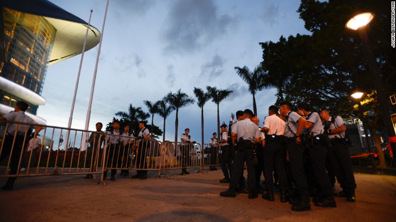 Police arrested protesters in Hong Kong&#39;s Golden Bauhinia Square ahead of the 20th anniversary of the city&#39;s handover to China on Wednesday.