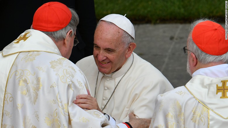 Pope Francis greets Cardinal George Pell at the Vatican in  November 2016. 