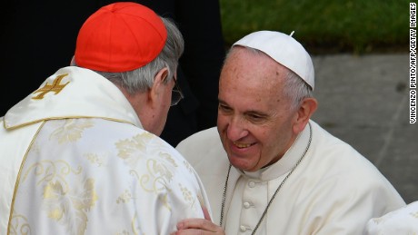 Pope Francis (C) greets cardinal George Pell (L) of Australia after the celebration of a mass marking the end of the Jubilee of Mercy, on November 20, 2016 in Vatican. 
Pope Francis on Sunday brought to a close the Catholic Church&#39;s &quot;Year of Mercy,&quot; shutting the Holy Door at Saint Peter&#39;s after a packed 12 months that saw him raise Mother Teresa to sainthood and re-home Syrian Muslim refugees. / AFP / VINCENZO PINTO        (Photo credit should read VINCENZO PINTO/AFP/Getty Images)