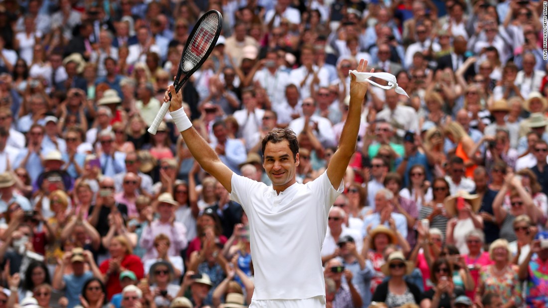 Federer waves to the crowed after his victory. 