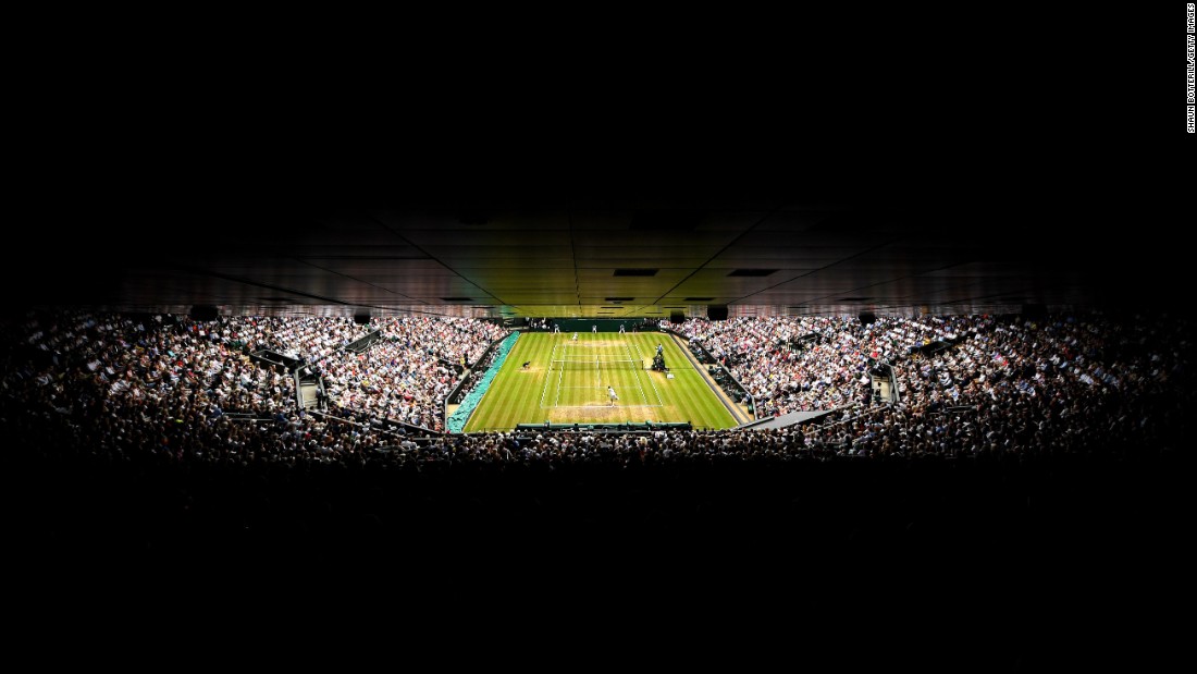 Federer and Cilic entertain a packed Centre Court during the men&#39;s final on day 13 of  Wimbledon.