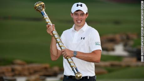 DUBAI, UNITED ARAB EMIRATES - NOVEMBER 20:  Matthew Fitzpatrick of England with the DP World Tour Championship Trophy after the final round of the DP World Tour Championship at Jumeirah Golf Estates on November 20, 2016 in Dubai, United Arab Emirates.  (Photo by Ross Kinnaird/Getty Images)