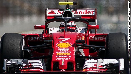 Scuderia Ferrari&#39;s driver Kimi Raikkonen tests the so-called halo cockpit protection device during first practice session of the Formula One Brazilian Grand Prix , in Sao Paulo, Brazil on November 11, 2016.  / AFP / Miguel SCHINCARIOL        (Photo credit should read MIGUEL SCHINCARIOL/AFP/Getty Images)