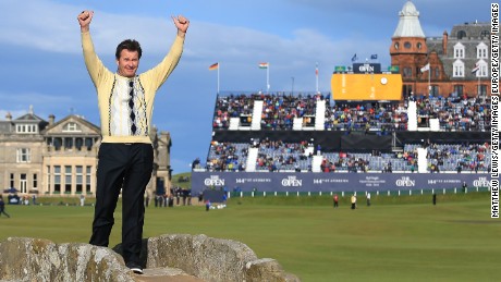 ST ANDREWS, SCOTLAND - JULY 17:  Sir Nick Faldo of England waves to the crowd as he stands on Swilcan Bridge during the second round of the 144th Open Championship at The Old Course on July 17, 2015 in St Andrews, Scotland. This is Faldo&#39;s last Open at the course.  (Photo by Matthew Lewis/Getty Images)