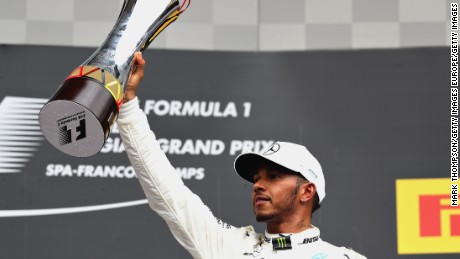 SPA, BELGIUM - AUGUST 27:  Race winner Lewis Hamilton of Great Britain and Mercedes GP celebrates on the podium  during the Formula One Grand Prix of Belgium at Circuit de Spa-Francorchamps on August 27, 2017 in Spa, Belgium.  (Photo by Mark Thompson/Getty Images)