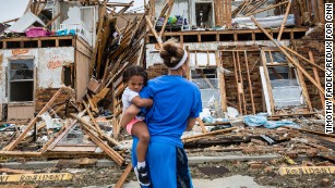 Residents of Rockport, Texas, return to their destroyed home on Sunday, August 27. Hurricane Harvey made landfall in Texas shortly after 11 p.m. Friday, just north of Port Aransas. The Category 4 storm was the strongest hurricane to hit the United States since Wilma in 2005.