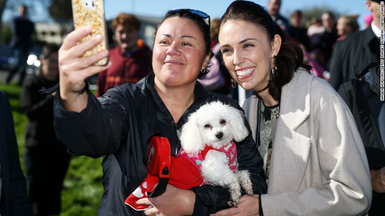 Ardern poses for a photo with a supporter on August 23 in Palmerston North, New Zealand.