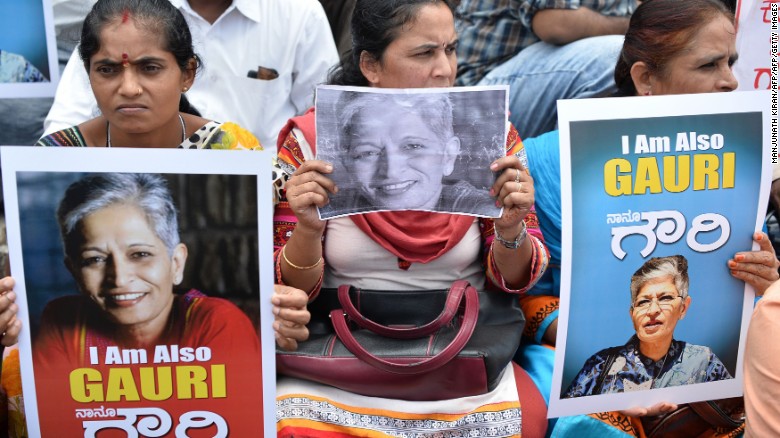 Indian protesters take part in a rally condemning the killing of journalist Gauri Lankesh in Bangalore on September 6, 2017.
