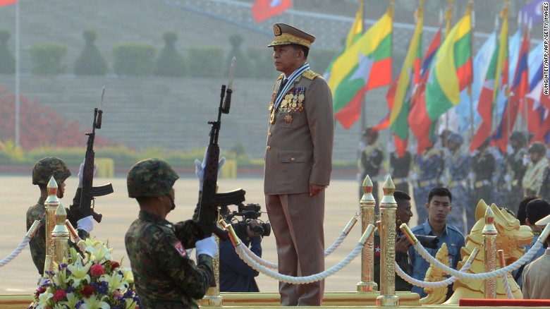 Days before Aung San Suu Kyi&#39;s government took office in March 2016, honor guards raised their bayonet mounted rifles in salute to Sen. General Min Aung Hlaing, commander-in-chief of the Myanmar armed forces, during a ceremony to mark the 71st Armed Forces Day.